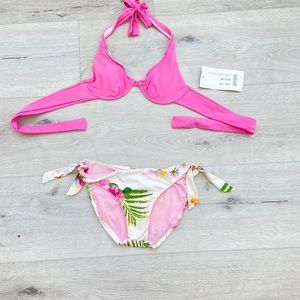 hot pink bikini top and tropical bikini bottoms